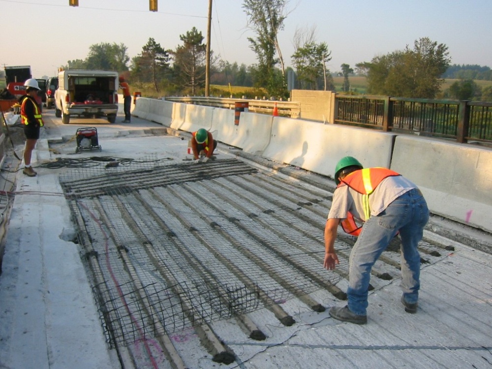 Galvashield DAS being installed on deck followed by a carbon fiber grid