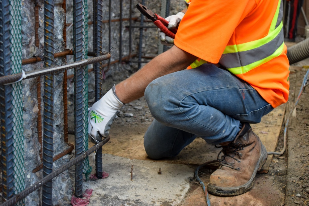 sacrificial anode providing cathodic protection being installed on rebar